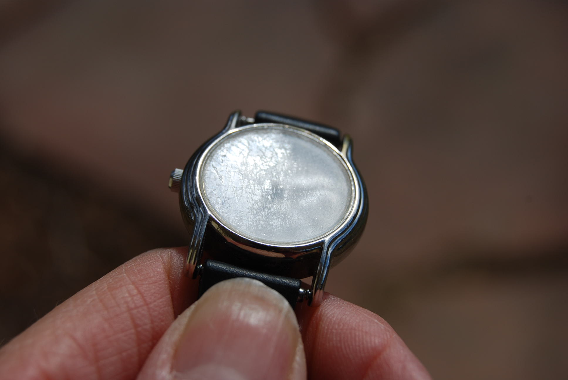 Vintage Watch Before restoring etched glass with cerium oxide